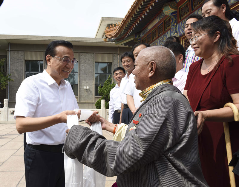為什么這位老師能受到李克強的高規(guī)格接見？